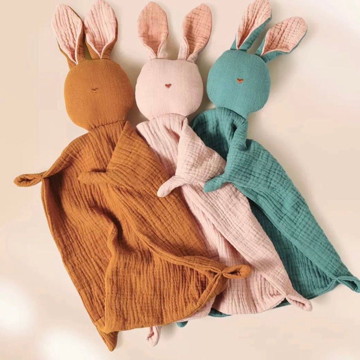 Swaddles, comforters, bibs and teether